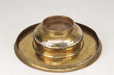Lot 776 - A 19TH CENTURY ISLAMIC BRASS AND SILVER INLAID WASH BASIN WITH CENTRAL PIERCED STRAINER