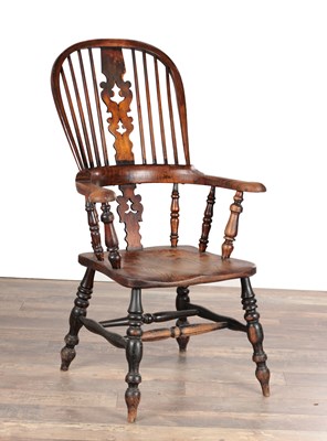 Lot 1684 - A 19TH CENTURY ASH AND ELM BROAD ARM WINDSOR ARMCHAIR