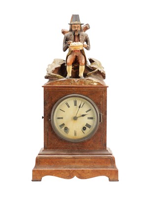 Lot 1321 - A RARE 19TH CENTURY BLACK FOREST FIGURED WALNUT AUTOMATON "DUMPLING EATER" MANTEL CLOCK