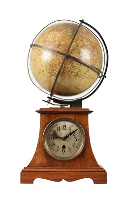 Lot 1296 - A CIRCA 1910 GERMAN MAHOGANY REVOLVING GLOBE CLOCK