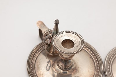 Lot 67 - A PAIR OF VICTORIAN ENGLISH SILVER CHAMBERSTICKS WITH CONICAL SNUFFERS