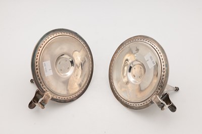 Lot 67 - A PAIR OF VICTORIAN ENGLISH SILVER CHAMBERSTICKS WITH CONICAL SNUFFERS