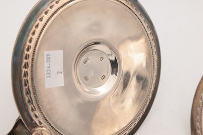 Lot 67 - A PAIR OF VICTORIAN ENGLISH SILVER CHAMBERSTICKS WITH CONICAL SNUFFERS