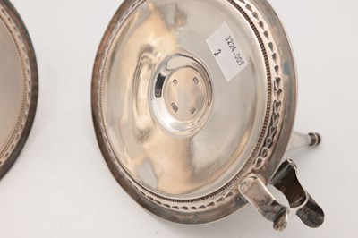 Lot 67 - A PAIR OF VICTORIAN ENGLISH SILVER CHAMBERSTICKS WITH CONICAL SNUFFERS