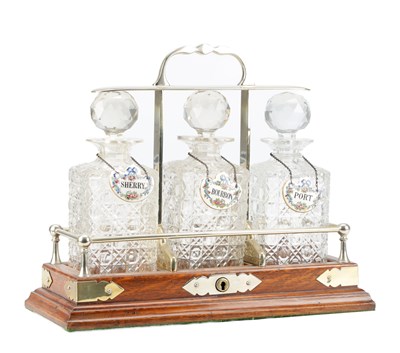 Lot 1130 - A 19TH CENTURY SILVER PLATED AND MAHOGANY TANTALUS