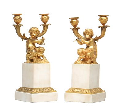 Lot 1167 - A PAIR OF GILT BRONZE TWO BRANCH CANDELABRA ON WHITE MARBLE BASES