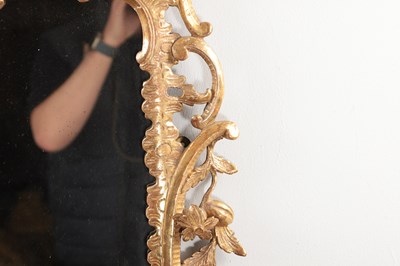 Lot 1540 - A GEORGE III STYLE GILT GESSO HANGING MIRROR