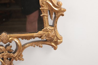 Lot 1540 - A GEORGE III STYLE GILT GESSO HANGING MIRROR