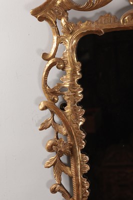 Lot 1540 - A GEORGE III STYLE GILT GESSO HANGING MIRROR
