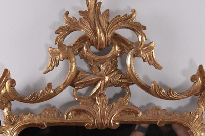Lot 1540 - A GEORGE III STYLE GILT GESSO HANGING MIRROR