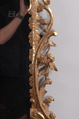 Lot 1540 - A GEORGE III STYLE GILT GESSO HANGING MIRROR