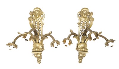 Lot 1083 - A PAIR OF 20TH CENTURY FRENCH CAST BRASS THREE BRANCH WALL SCONCES