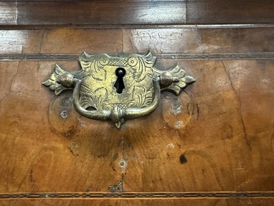 Lot 1688 - A GOOD EARLY 18TH CENTURY FIGURED WALNUT SECRETAIRE CHEST ON CHEST WITH STARBURST INLAID BASE