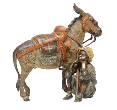 Lot 1131 - FRANZ BERGMAN AN EARLY 20TH CENTURY AUSTRIAN COLD-PAINTED BRONZE GROUP OF A DONKEY AND SEATED BOY