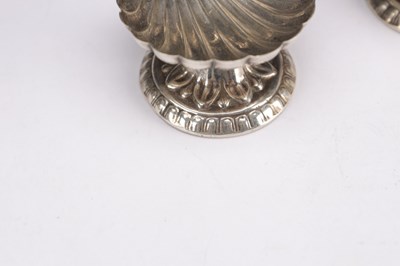Lot 84 - A PAIR OF 19TH CENTURY SILVER SHELL-FORM SALTS WITH FISH FINIALS