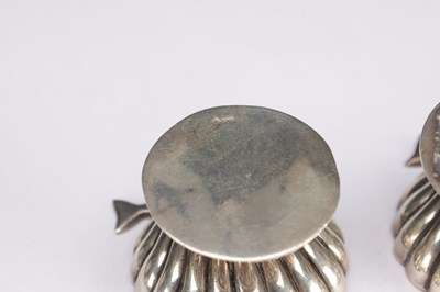 Lot 84 - A PAIR OF 19TH CENTURY SILVER SHELL-FORM SALTS WITH FISH FINIALS