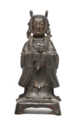 Lot 733 - AN EARLY CHINESE BRONZE FIGURE OF AN IMMORTAL