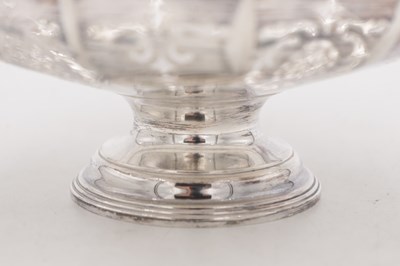 Lot 105 - A GEORGE V ENGLISH SILVER SWING-HANDLED BASKET