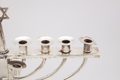 Lot 81 - A GEORGE VI ENGLISH SILVER HANUKKAH MENORAH