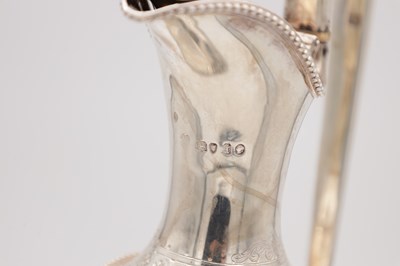 Lot 85 - A VICTORIAN ENGLISH SILVER EWER