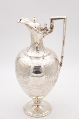 Lot 85 - A VICTORIAN ENGLISH SILVER EWER