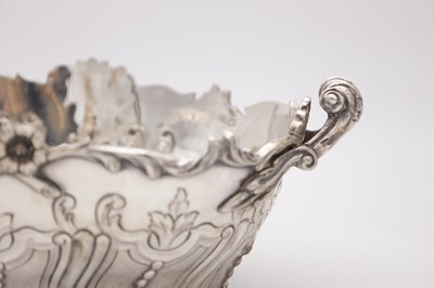 Lot 115 - A PAIR OF EDWARDIAN ENGLISH SILVER TWO-HANDLED BASKETS