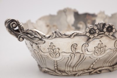 Lot 115 - A PAIR OF EDWARDIAN ENGLISH SILVER TWO-HANDLED BASKETS