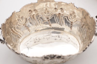 Lot 115 - A PAIR OF EDWARDIAN ENGLISH SILVER TWO-HANDLED BASKETS