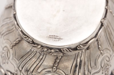 Lot 115 - A PAIR OF EDWARDIAN ENGLISH SILVER TWO-HANDLED BASKETS
