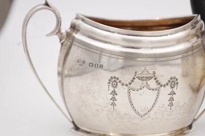 Lot 110 - A GEORGE V ENGLISH SILVER THREE PIECE TEA SET