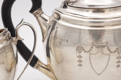 Lot 110 - A GEORGE V ENGLISH SILVER THREE PIECE TEA SET