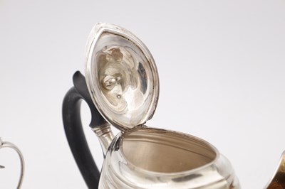 Lot 110 - A GEORGE V ENGLISH SILVER THREE PIECE TEA SET