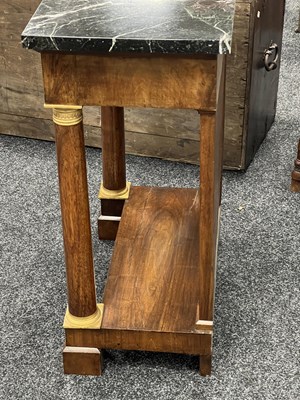 Lot 1489 - A PAIR OF EARLY 19TH CENTURY FRENCH ORMOLU MOUNTED MAHOGANY CONSOLE TABLES