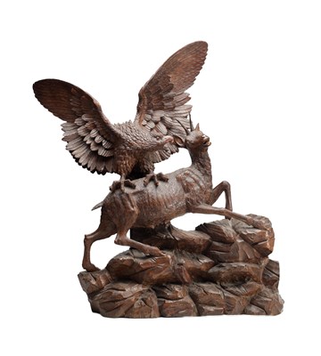 Lot 1391 - A LARGE AND IMPRESSIVE BLACK FOREST CARVED WOOD GROUP OF AN EAGLE ATTACKING A CHAMOIS