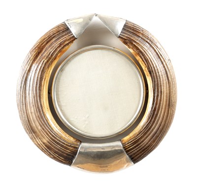 Lot 1140 - AN EARLY 20TH CENTURY SILVER MOUNTED BOAR'S TUSK HANGING SWIVEL MIRROR