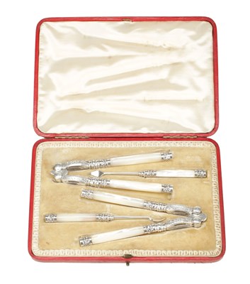 Lot 1141 - A FINE VICTORIAN ENGLISH SILVER MOUNTED MOTHER OF PEARL NUTCRACKERS AND PICKS CASED SET
