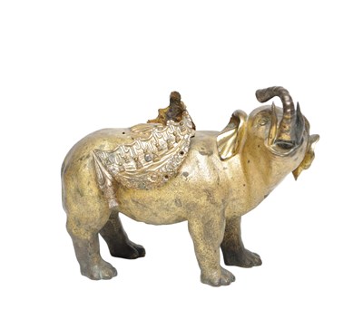 Lot 728 - A 19TH CENTURY EASTERN GILT BRONZE MODEL OF A CAPARISONED ELEPHANT