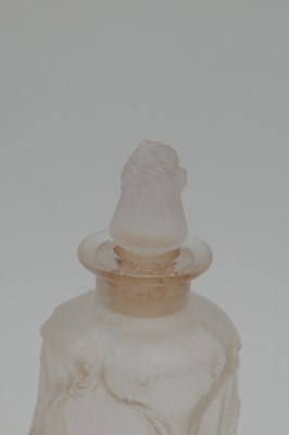 Lot 562 - RENE LALIQUE A FROSTED GLASS 'PAN' PERFUME BOTTLE AND STOPPER