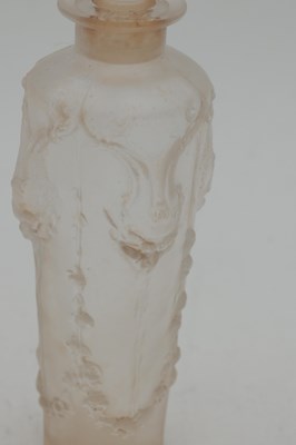 Lot 562 - RENE LALIQUE A FROSTED GLASS 'PAN' PERFUME BOTTLE AND STOPPER