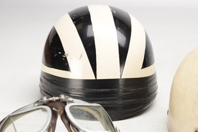 Lot 1475 - A COLLECTION OF THREE VINTAGE MOTORCYCLE HELMETS AND A PAIR OF GOGGLES