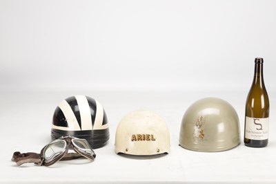 Lot 1475 - A COLLECTION OF THREE VINTAGE MOTORCYCLE HELMETS AND A PAIR OF GOGGLES