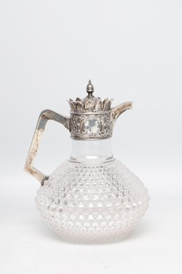 Lot 48 - A VICTORIAN ENGLISH SILVER MOUNTED CUT GLASS CLARET JUG