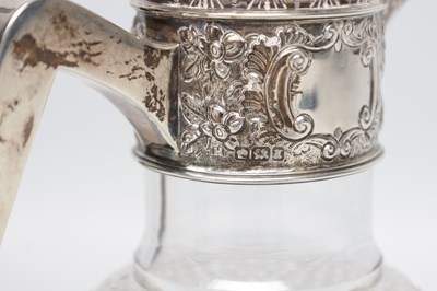 Lot 48 - A VICTORIAN ENGLISH SILVER MOUNTED CUT GLASS CLARET JUG