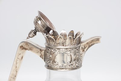 Lot 48 - A VICTORIAN ENGLISH SILVER MOUNTED CUT GLASS CLARET JUG