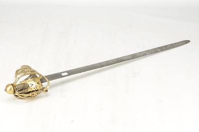 Lot 842 - AN 18TH CENTURY SCOTTISH BRASS HILTED BASKET-HILT SWORD