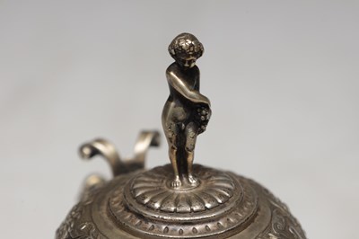 Lot 50 - A CONTINENTAL SILVER LIDDED TANKARD WITH FIGURAL FINIAL