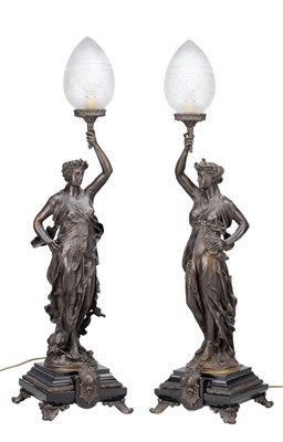 Lot 1092 - A LARGE PAIR OF EARLY 20TH CENTURY PATINATED METAL FIGURAL LAMPS WITH ETCHED GLASS SHADES