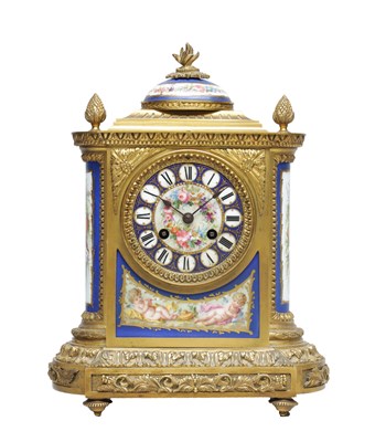 Lot 1331 - A LATE 19TH CENTURY FRENCH ORMOLU AND PORCELAIN PANELED MANTEL CLOCK