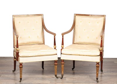 Lot A PAIR OF SIMULATED ROSEWOOD AND PARCEL GILT LIBRARY CHAIRS