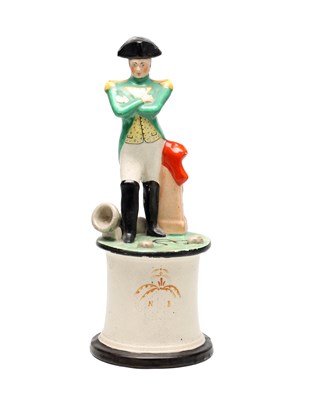 Lot A 19TH CENTURY STAFFORDSHIRE POTTERY FIGURE OF NAPOLEON BONAPARTE